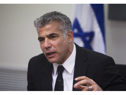 لابيد فخور بمجزرة حي الشجاعية لابيد