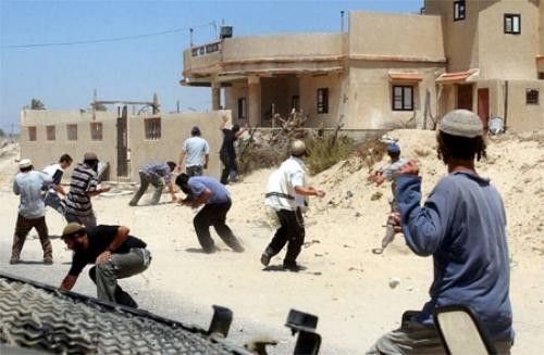 مستوطنون يهاجمون منازل شرق الخليل صورة أرشيفية