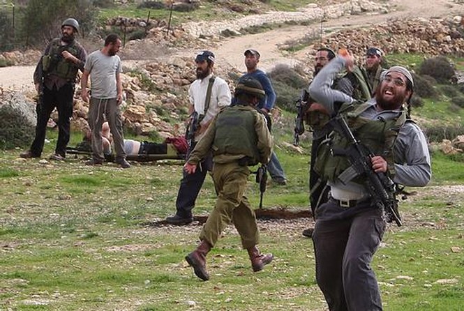 أهالي المغير يتصدون لمستوطنين حاولوا إحراق أحد المنازل
