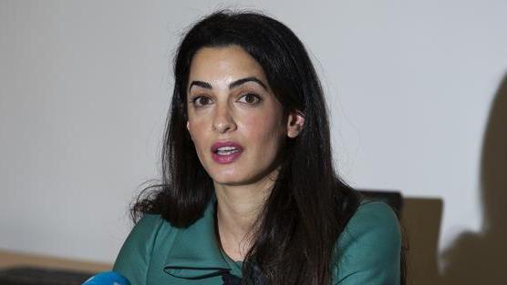 أمل كلوني تقطع اجازة شهر العسل امل علم الدين