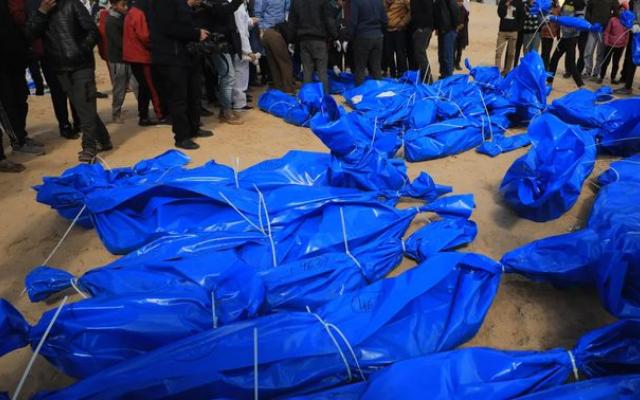 الاحتلال ينسف مجمع الصخرة التجاري في غزة واستعدادات لتشييع جثامين نحو 100 شهيد