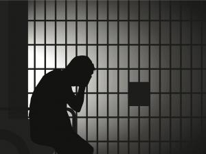 تبرئة رجل بعد 33 عاماً في السجن