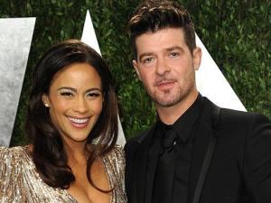 في أغنية أمام الملايين ..روبن ثيك يطلب من زوجته العودة إليه!