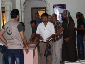 توزيع الطرود من جمعية عطاء فلسطين الخيرية 