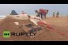 Embedded thumbnail for فنان هندي ينشئ تمثالا من الرمل لطائرة الركاب المنكوبة 